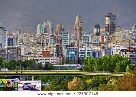 Tehran, Iran - April 28, 2017: A View Of The Pedestrian Abo Atash Bridge And Multi-storey Buildings 