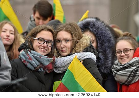 Vilnius, Lithuania - February 16: Unidentified People Gathered With Flags In A Natonal Celebration F