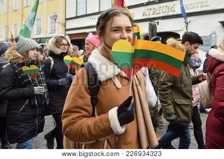 Vilnius, Lithuania - February 16: Unidentified People Gathered With Flags In A Natonal Celebration F