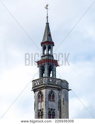 Bruges, Belgium - February 2018: Tower Of Poortersloge, Aka Burghers Lodge, At Spiegelrei Canal In B