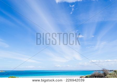 Blue Sky With Clouds Over La Pelosa Beach, Sardinia