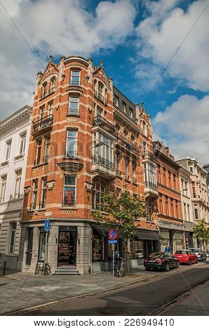 Antwerp, Northern Belgium - July 02, 2017. People And Buildings In A Street Of Antwerp. Port And Mul