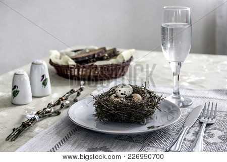On The Table Napkin With A Plate Vegetable Stew Green Onion Glass Fork Knife And Willow Branches Sal