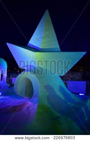 Breckenridge, Colorado, Usa: Jan 28, 2018: 2018 Navigare Necesse Est At Night Snow Sculpture By Team