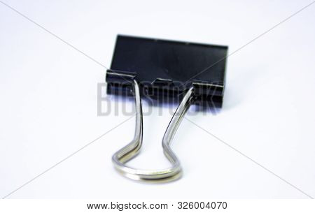 School Stationary, Black Paper Clip Isolated On White Background,
