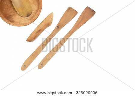 Flat Lay Wood Wooden Pepper Mill And Spoon Isolated On White Background With Space For Text, Top Vie