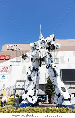 Tokyo, Japan - April 28, 2019, The Unidentified Traveler Look At Rx-0 Unicorn Gundam Statue In Norma