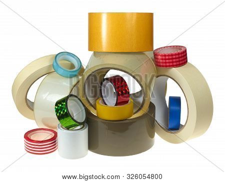 Several Rolls With Adhesive Tapes Lie On Top Of Each Other Against A White Background.