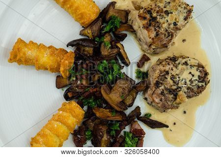 Roasted Tenderloin Cut With Fresh Mushrooms Of The Forest