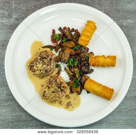 Roasted Tenderloin Cut With Fresh Mushrooms Of The Forest