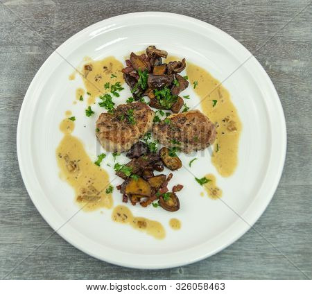 Roasted Tenderloin Cut With Fresh Mushrooms Of The Forest