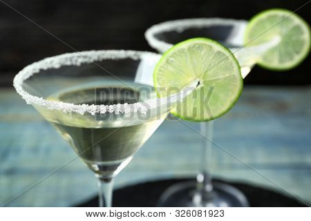Glasses Of Lime Drop Martini Cocktail On Table, Closeup