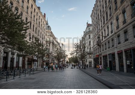Lyon, France - July 14, 2019:  Pedestrians Walking On Rue De La Republique Street In Lyon, France, A