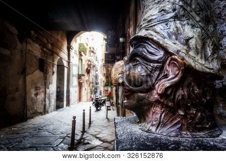 Traditional Mask With Face Of Pulcinella In Spaccanapoli Street, In The Old Town Of Naples, Campania