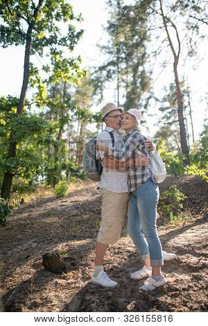 Couple Hugging While Feeling So Happy Having Vacation Together