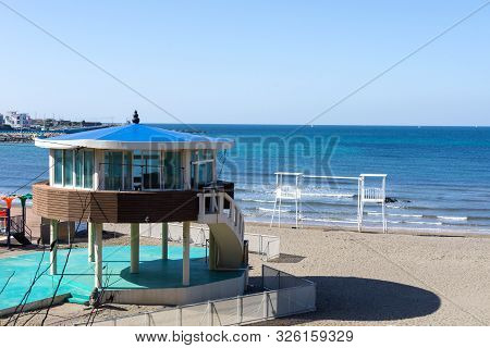 Jeju, South Korea - November 20, 2018: White Lifeguard Chairs At The Iho Tewoo Beach, Korea