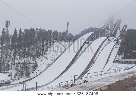 Lahti, Finland- 02 March 2015: Salpausselka, Center Of Ski Jumps In Winter Cloudy Day. Three Concret