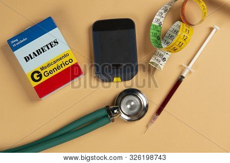 Fake Medicine Box With The Name Of The Disease Diabetes And A Glucometer