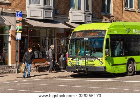 Quebec City, Canada - 5 October 2019: A Rtc Bus Taking On Passengers On Rene Levesque Bld.