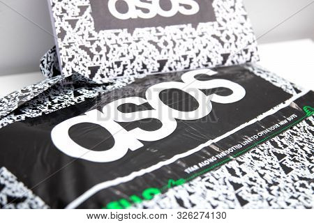 Geneva/switzerland-10.08.18: Asos Online Shopping Clothes Package Logo