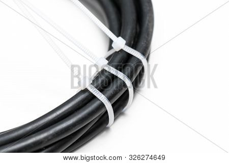 Black Wire Cable With White Zip Tie Self Lock