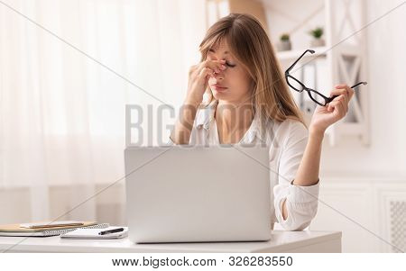 Eyes Fatigue. Frustrated Businesswoman Massaging Nosebridge Having Ocular Hypertension Sitting At La