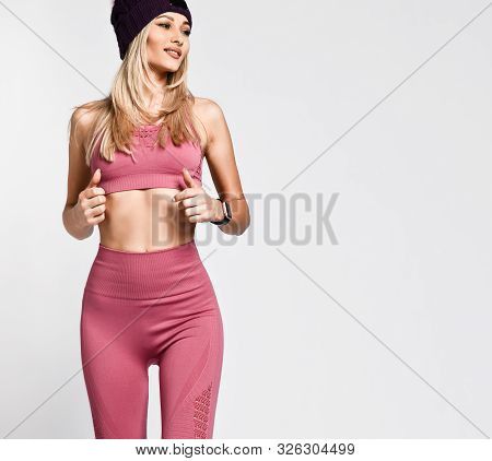 Beautiful Sexy Blonde Woman With Perfect Athletic Slim Figure By Physical Education Or Fitness, Lead