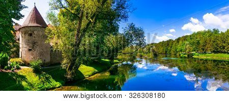 Wonderful romantic castle on the island ,medieval Grad Otocec in Krka river, Slovenia
