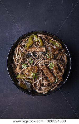 Stir-fried Sona With Pork And Vegetables In Asian Style