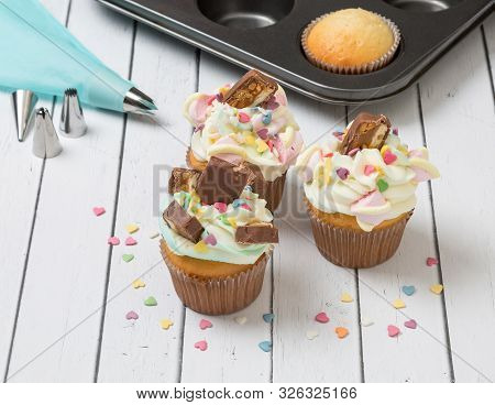 Cream Cupcakes With Valentines And Chocolate. Pastry.