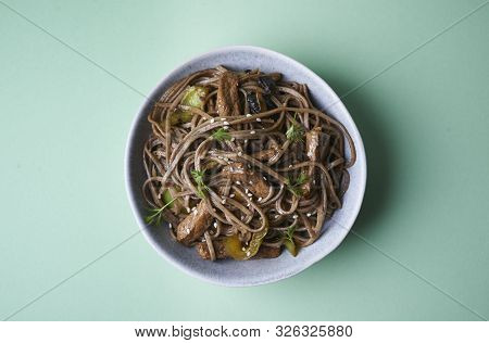 Stir-fried Sona With Pork And Vegetables In Asian Style
