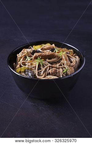 Stir-fried Sona With Pork And Vegetables In Asian Style