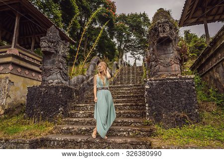 Woman Tourist In Abandoned And Mysterious Hotel In Bedugul. Indonesia, Bali Island. Bali Travel Conc