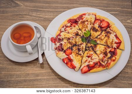 Delicious Strawberry Pizza On A Balinese Tropical Nature Background. Bali Island, Indonesia