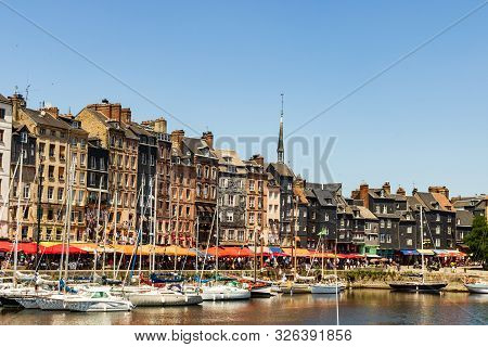 Honfleur Harbor In Normandy, Restaurant Street With Marina View In Honfleur, France, 2019