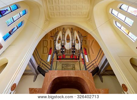Novelda, Spain- October 3, 2019: View To The Ceiling And Pipe Organ Musical Instrument Inside Of San