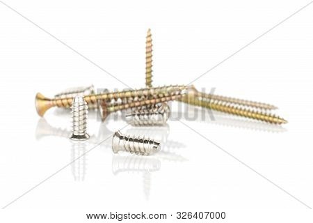 Lot Of Whole Disordered Metallic Glossy Bolt Isolated On White Background