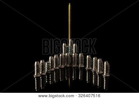 Group Of Seventeen Whole Metallic Glossy Bolt Building Isolated On Black Glass