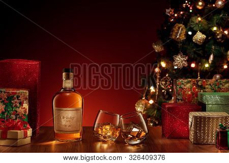 No Logo Or Trademark! Self Made Labels!  Close Up View  Of Two Glasses With Whiskey On Color Back.