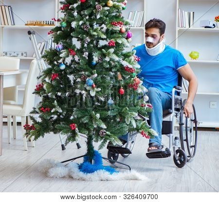 Injured disabled man celebrating christmas at home