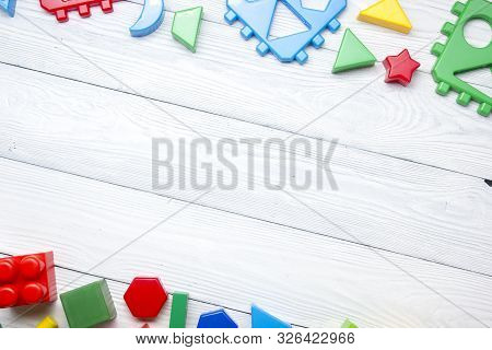 Kids Educational Developing Toys Frame On White Background. Top View. Flat Lay. Copy Space For Text