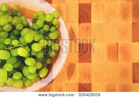 Green Grape On The Wooden Cutting Board