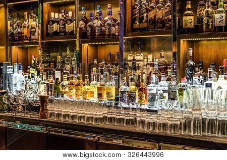 24.02.2019 Peking China - Wall With Bitters And Alcohols Whiskey Bar Counter Bottles Ambient Tlight 