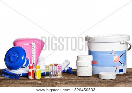 Equipment With Chemical Cleaning Products And Tools For The Maintenance Of The Swimming Pool On A Wo