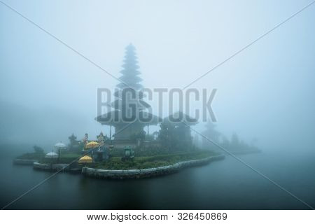 Foggy weather at Pura Ulun Danu Beratan temple in Bali, Indonesia.