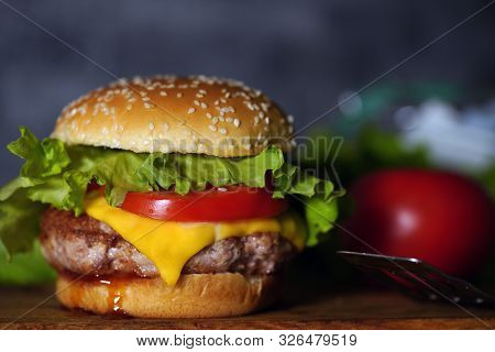 Homemade Hamburger With Fresh Vegetables. Tasty Grilled Burger With With Beef, Cheese, Vegetables. D