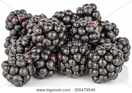 Lot Of Whole Fresh Black Blackberry Stack Isolated On White Background