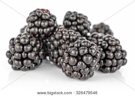 Lot Of Whole Fresh Black Blackberry Heap Isolated On White Background