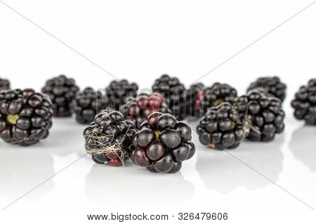 Lot Of Whole Dark Fresh Black Blackberry Isolated On White Background