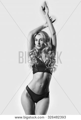 Fashionable Female Red Bra And Panties. Gorgeous Woman. Girl Slim Sexy Fashion Model Curly Hairstyle